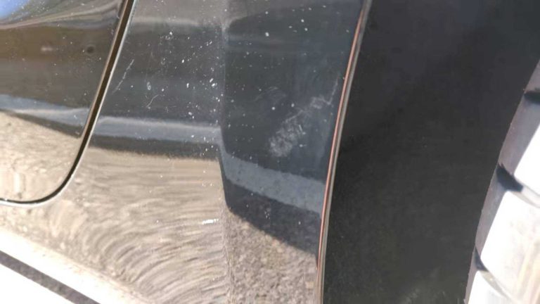 damaged Tesla paint